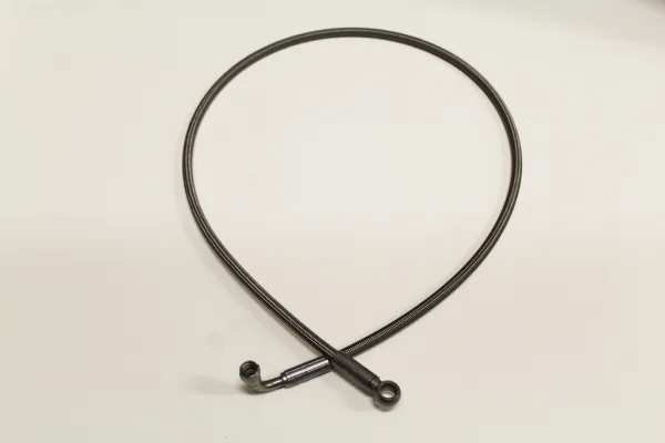 Oil supply line 1.20m with D04 90° and straight connection - Teflon PTFE inside stainless steel outside