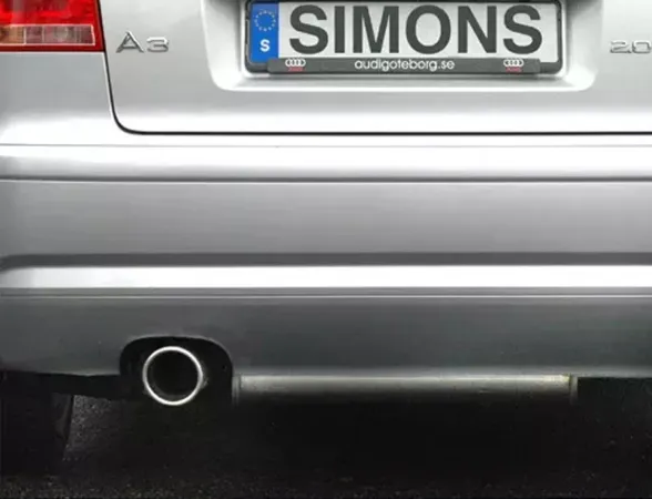 Close-up of the rear of a silver Audi A3 (8P) with a Simons stainless steel sports exhaust. The tailpipe is 1x100 mm and the license plate reads "Simons".