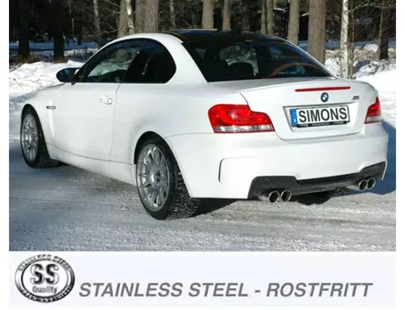 White BMW E82 1 Series M Coupé in the snow. Rear view with four stainless steel tailpipes of a Simons sports exhaust system duplex 2x90 mm. Simons License plate. Logo with "Stainless Steel" lettering in the foreground.