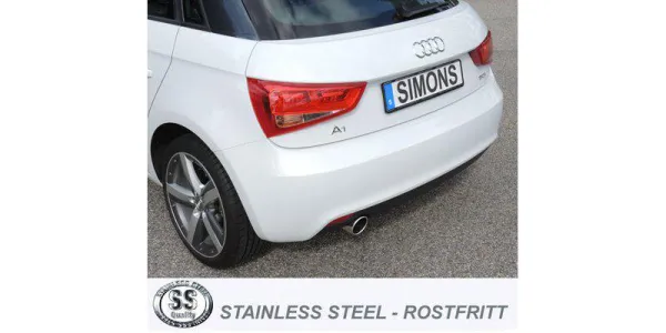Rear view of a white Audi A1. The focus is on the Simons stainless steel sports exhaust with 1x90 mm tailpipe, mounted below the bumper. The license plate shows the brand name "Simons". A "Stainless Steel" logo is visible in the lower area.