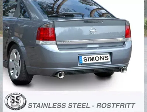 Rear view of a gray Opel Vectra C with Simons sports exhaust system. The duplex tailpipes, each 100 mm round, are clearly visible. The license plate bears the Simons lettering. The "Stainless Steel" logo can be seen in the foreground.