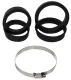 Black rubber adapter rings of various sizes are stacked on a white surface. At the bottom is a shiny metal hose clamp with an adjustment mechanism. Used to adapt a sports air filter.